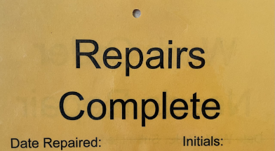 Repairs complete label 